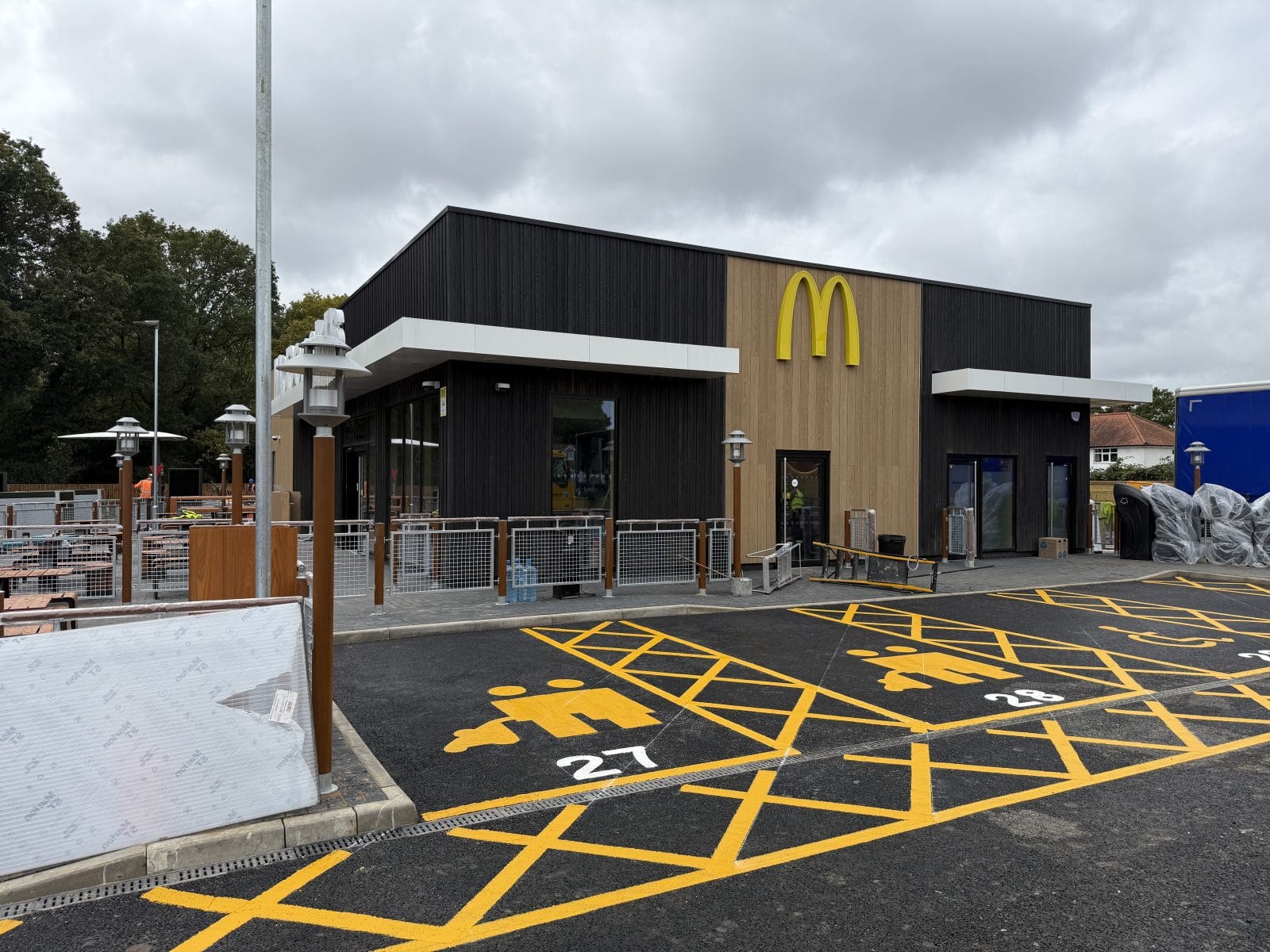 McDonald's restaurant with newly painted yellow parking and road markings.