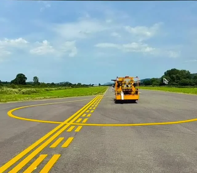 Refreshed yellow taxiway markings at Welshpool Airport