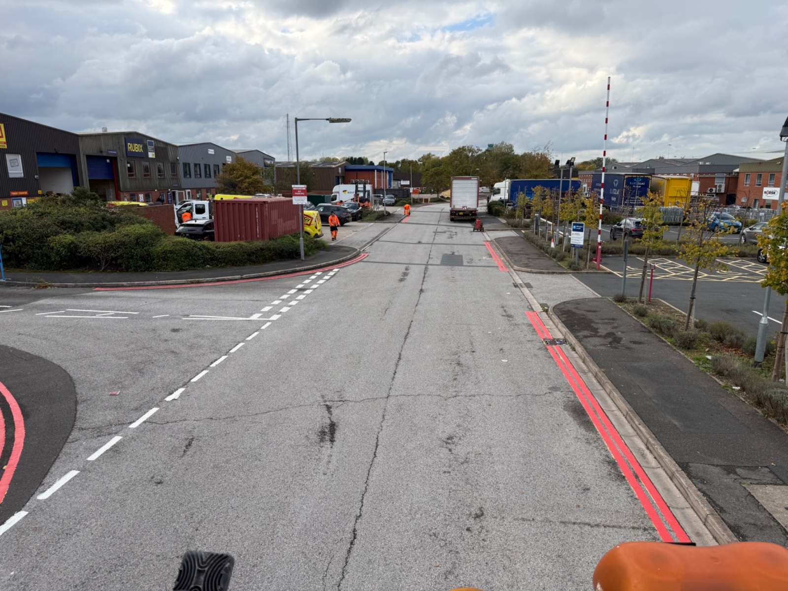 After: double red lines installed by Tomras on Argosy Road at East Midlands Airport